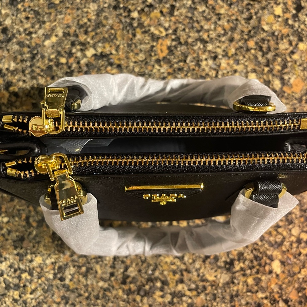 Black Handbag with Gold Accents